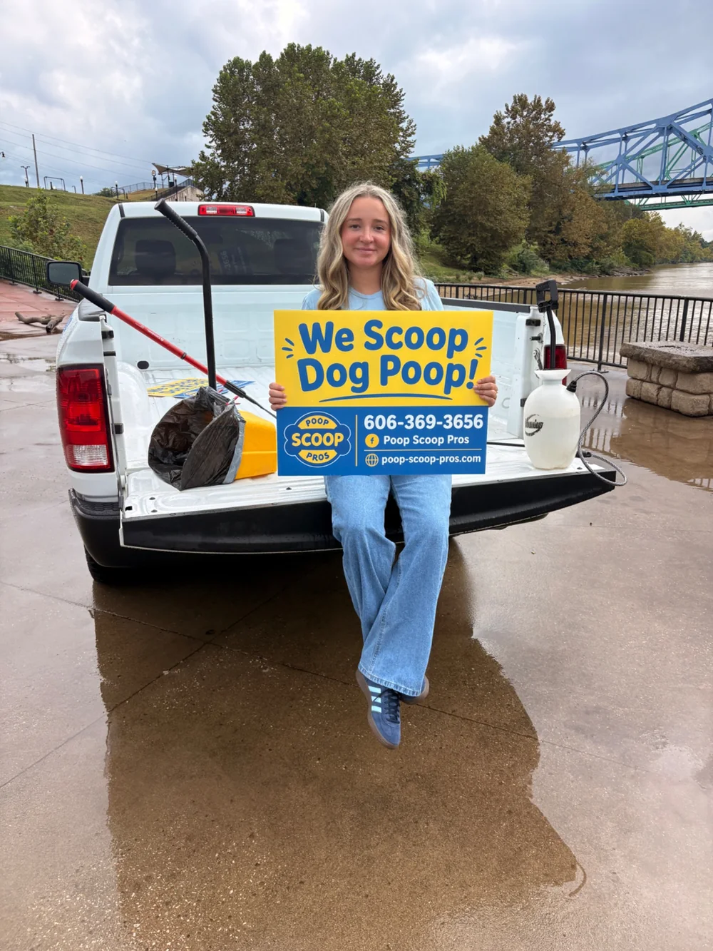 Poop Scoop Pros team member with the company truck